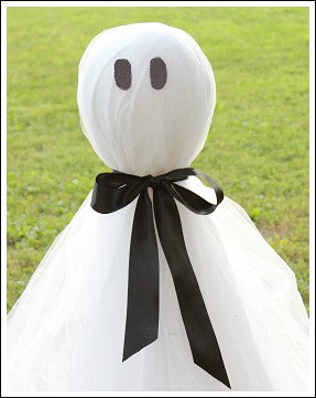how to make a ghost, crafts, halloween decorations, seasonal holiday decor, The tulle just makes him stand out in the sun