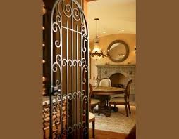 tuscan decor inspirations, home decor, kitchen design, kitchen island, Anything that offers wrought iron such as this gate it has my name on it Love this Hobby Lobby visit They have awesome pieces similar to this I could use in my own space