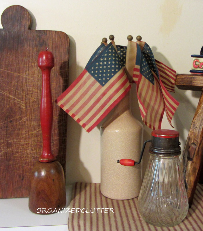 patriotic kitchen vignette, patriotic decor ideas, repurposing upcycling, seasonal holiday d cor, I started with flags and red items The nut grinder and the red handled masher were handy even better