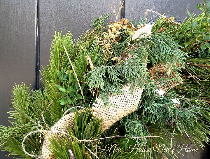 natural christmas decor, christmas decorations, outdoor living, seasonal holiday decor, wreaths, Adding more cuttings and burlap ribbon to a store bought wreath gives it a custom look