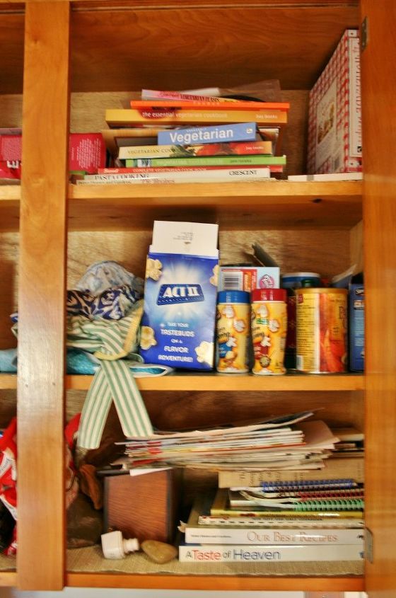 organizing kitchen cabinets with a cork message center, kitchen cabinets, kitchen design, organizing, Here I store all my recipes both loose and in books