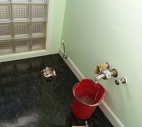 bathroom makeover, bathroom ideas, home decor, home improvement, I repaired the wall where the backsplash was primed painted a minty green and laid new flooring 12 marble look vinyl tile I also added new trim