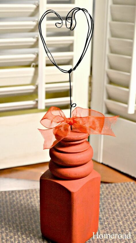 repurposed valentine s photo holder, repurposing upcycling, seasonal holiday d cor, valentines day ideas, Red paint and a bow turn this sawed off chair leg into a cute little Valentine s photo holder