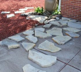 transforming my backyard into a secret garden part 2, flowers, gardening, landscape, perennial, raised garden beds, First I had laid out the stones on the driveway to be able to see the shapes