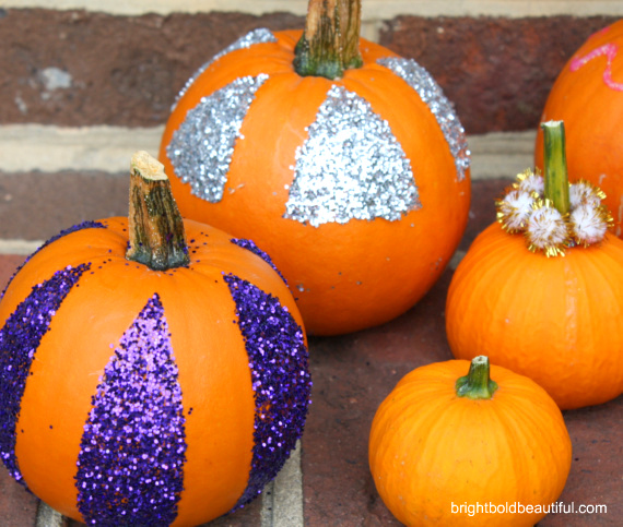 no carve pumpkin decorating idea, crafts, seasonal holiday decor, Spray on glue and pour on the glitter