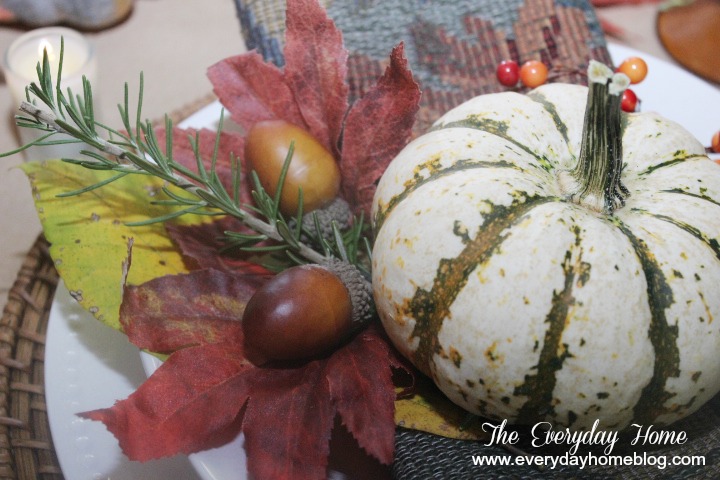 a thankful tablescape, christmas decorations, seasonal holiday d cor, thanksgiving decorations, Pumpkins acorns and fall leaves and a sprig of rosemary decorate each placesetting