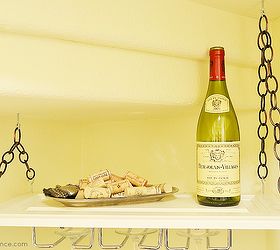 how to make a hanging wine rack from an old cabinet door, repurposing upcycling, Use chain link to hang the wine rack