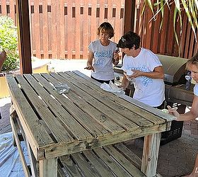 one way to make a pool party complete is to add in a few diy projects and wear, painted furniture, hard at work