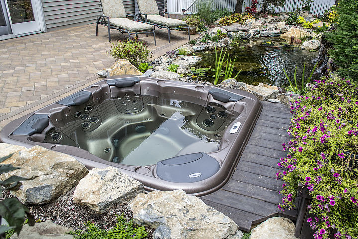 project spotlight love water features love to relax this is the best of both enjoy, outdoor living, patio, ponds water features, pool designs, spas, View of the chaise lounges where they sit to enjoy the sights and sounds of nature