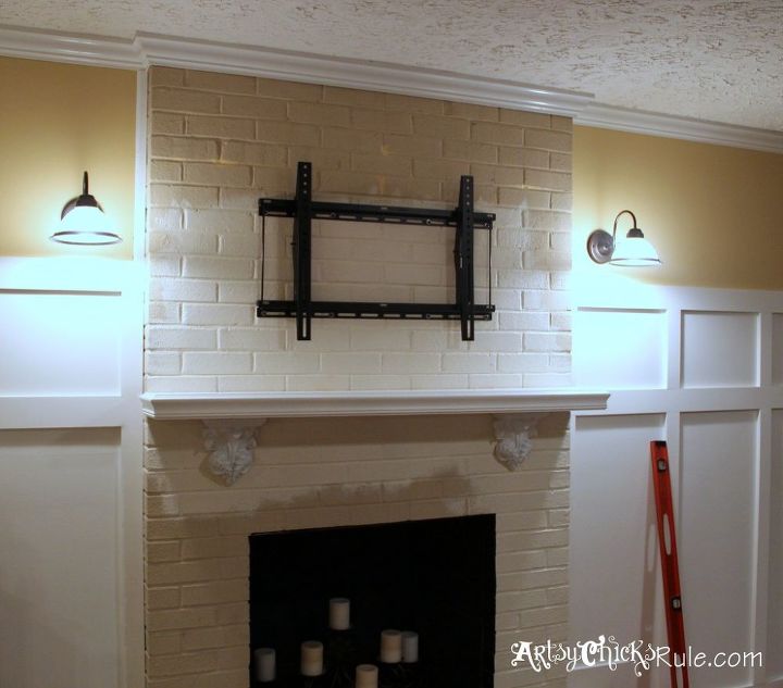 family room makeover a new tv a level, fireplaces mantels, home decor, living room ideas, painting, Mounting bracket to brick for the TV and that sneaky little level