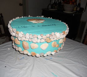 decorated cheese box, crafts, This is a side view of the cheese box I painted the inside grey and the outside turquoise Using a hot glue gun I attached a double row of shells on the lid a single row on the bottom and placed larger shells all around the middle