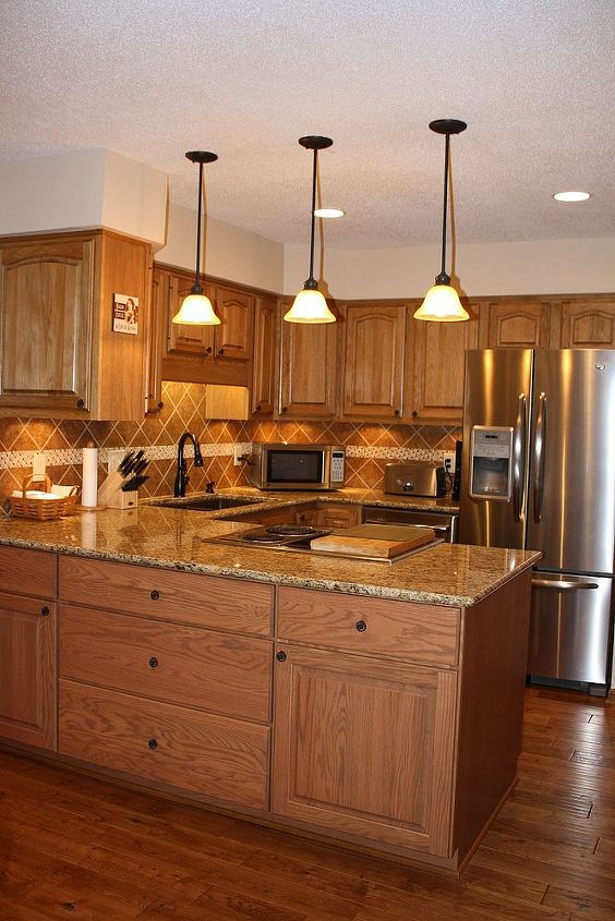 kitchens by red house remodeling, This is a cosmetic remodel in which the cabinets remained but everything else is new