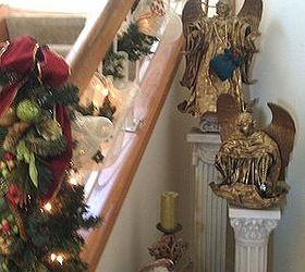 welcome to our christmas, christmas decorations, seasonal holiday decor, The stairway cove in the entry way The large angels are some of my favorite decorations