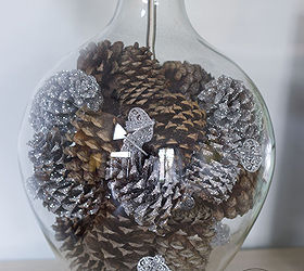 winter wonderland holiday lamp decorating challenge, lighting, seasonal holiday decor, Fill the base of your lamp with glittered and regular pine cones Throw some small glittered ornaments into the mix for an extra touch