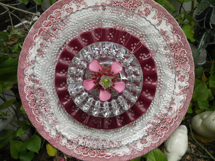 finally started making my plate flowers and glass towers what fun, This one really sparkles in the sun