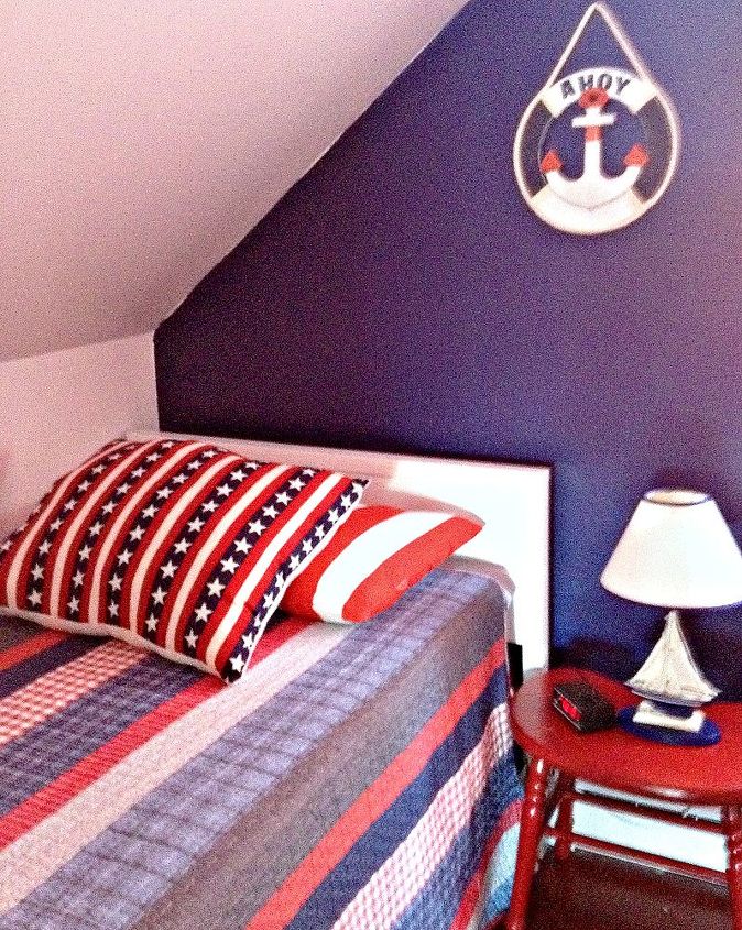 lake house kid s room transformation nautical cottage style, bedroom ideas, home decor, We found horizontal plank style head board and footboard at a yard sale and painted it white The horizontal lines look like the wooden planks on a boat so it worked out great Red night tables were found in an old cabin in Maine