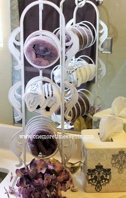 using a wine rack for guest hand towels, home decor, repurposing upcycling