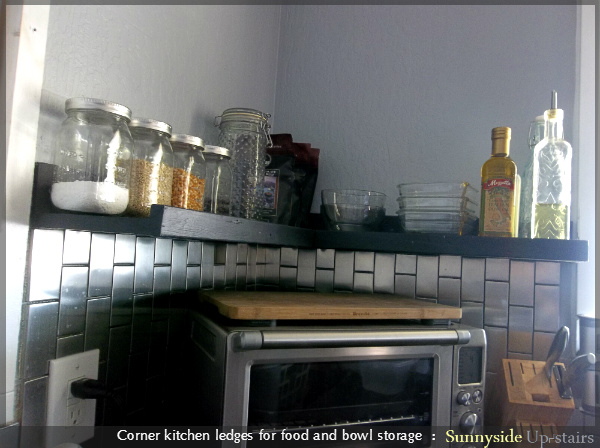 kitchen ledge shelves, diy, kitchen design, shelving ideas, storage ideas, woodworking projects, The corner ledge houses dry goods I use regularly bowls and various oils right above our baking and cooking area