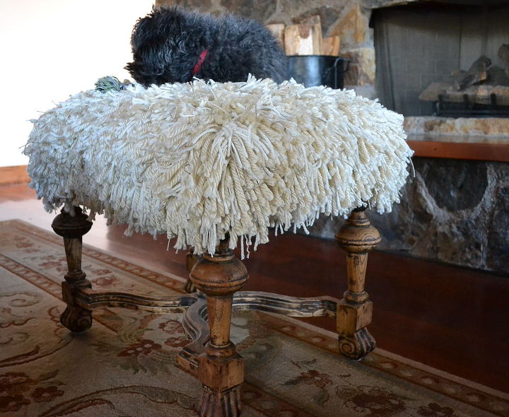 a groovy shaggy ottoman to rest my feet, flooring, painted furniture, The new resident of the shaggy ottoman The ottoman sits currently in the middle of our living room in front of the fireplace