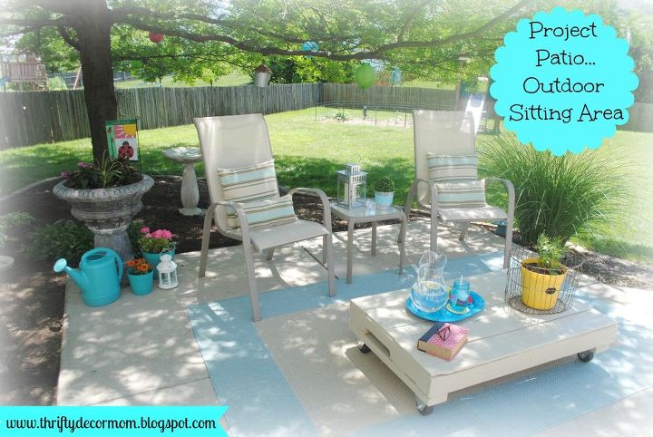 outdoor living space, outdoor living, Sitting area under shade tree Pillows are made from outdoor fabric and table was made from old pallet
