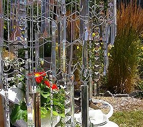 garden chandelier made from wire garden fencing, crafts, outdoor living, repurposing upcycling, Concentric circles of fencing create a tiered chandelier with dripping resin crystals