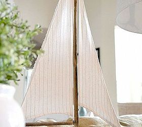 a simple vignette, home decor, A cute ship from Home Goods takes center stage