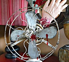 i m a fan of halloween, halloween decorations, repurposing upcycling, seasonal holiday d cor, Having fun at Halloween Lefty got to close to my vintage fan
