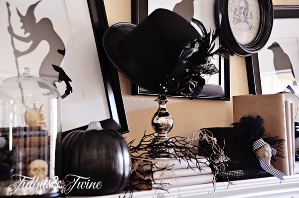 a black white halloween mantel, halloween decorations, seasonal holiday d cor, Black branches with Spanish moss cover the mantel