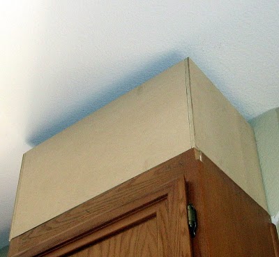 how to heighten the tops of your kitchen cabinets, kitchen cabinets, kitchen design, woodworking projects, Build a box using pine plywood in a smooth finish Anchor the box to the top of your existing cabinets