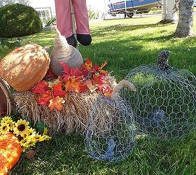 falling for pumpkins and sunflowers, curb appeal, gardening, outdoor living, repurposing upcycling, seasonal holiday decor, A close up of my chicken wire pumpkins I also wrapped jute and cording around the pumpkins gourds that are on the hay bale They were in need of a makeover
