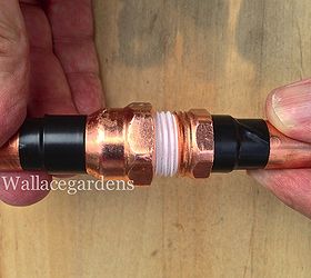 wine bottle watering device with copper tubing for container gardens