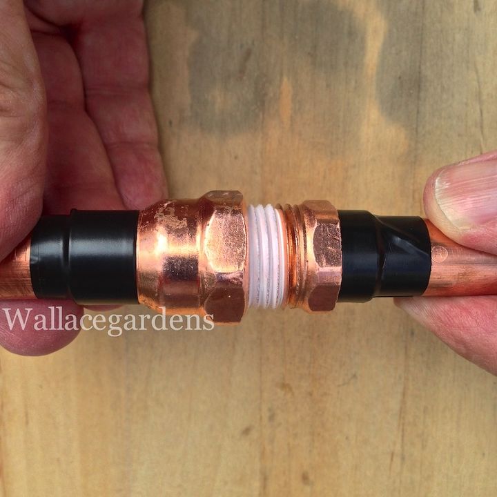 wine bottle watering device with copper tubing for container gardens