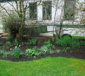 this is my next project how to make this prettier, gardening, landscape, My shade garden but look at the junk in behind