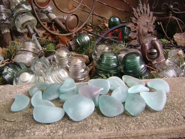 marie s rust garden, container gardening, gardening, repurposing upcycling, The end results after broken insulators are tumbled Rust and the cool aqua colors of tumbled glass go together well