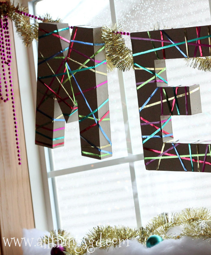 metallic ribbon wrapped holiday letters, seasonal holiday decor, To get this look simply cut strands of ribbon in various lengths and colors Tape one end of ribbon to the back of the letter wrap it around the front wherever you like and secure other end to the back with tape Repeat