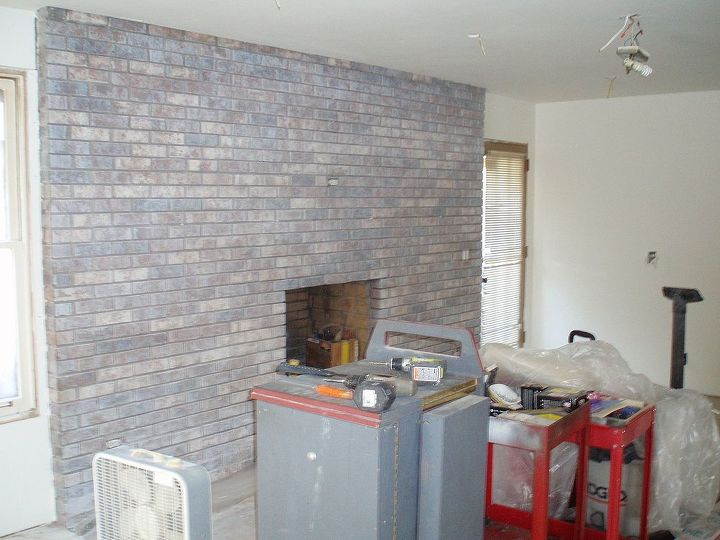 kitchen family room refurb, home improvement, living room ideas, wall decor, I have to post a better photo of this The fireplace was red brick and super dingy not to mention DATED I saw where someone had white washed their brick so tried my own method White paint in a spray gun with low pressure and water