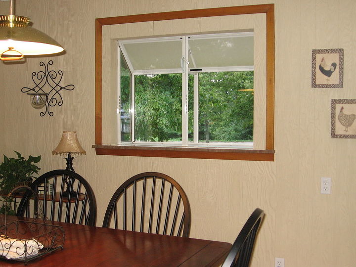 what should we do with our dining room wall, dining room ideas, wall decor, Another odd walll because of the strangely framed window It was added in the 80s and was a different size from the original window