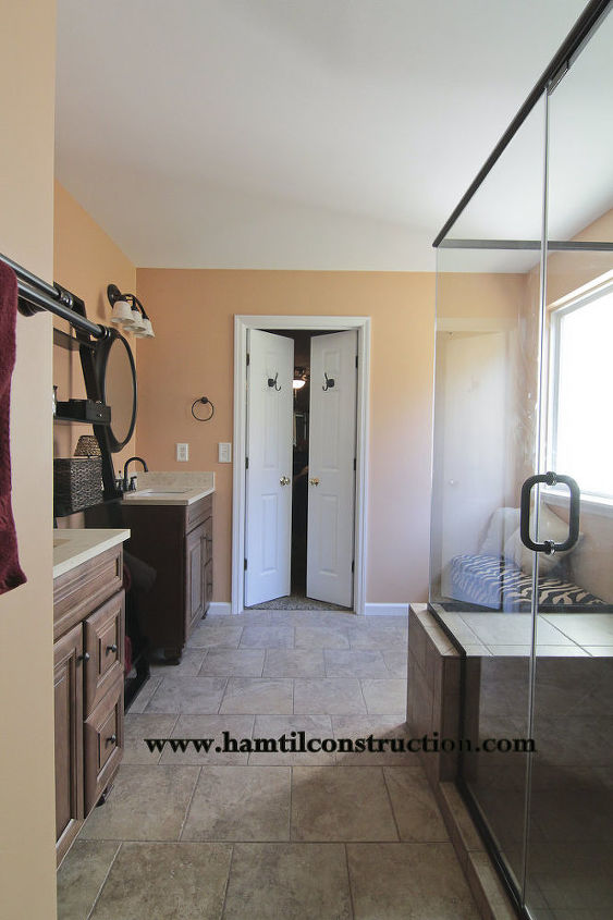 builder s grade bathroom turned to showcase space, bathroom ideas, home decor, home improvement, Warm and comfortable character now welcomes the couple into the space