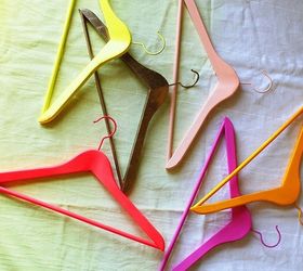 7 diy projects under 20, crafts, repurposing upcycling, Spray paint hangers Whether you want to color code your hangers for closet organization or just want to add a burst of color this idea is low effort and high reward Perfect