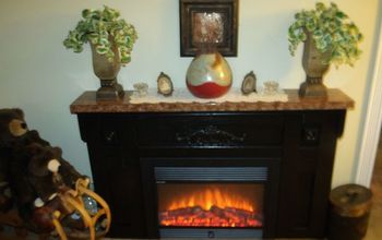 Custom Made Fireplace With Faux Granite Top.