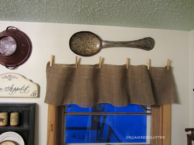 quick easy and cheap burlap valances, crafts, window treatments, I folded the sides under and used an iron on hemming tape to finish the side edges One garland made two valances I used clothespins to hang them on a cafe rod