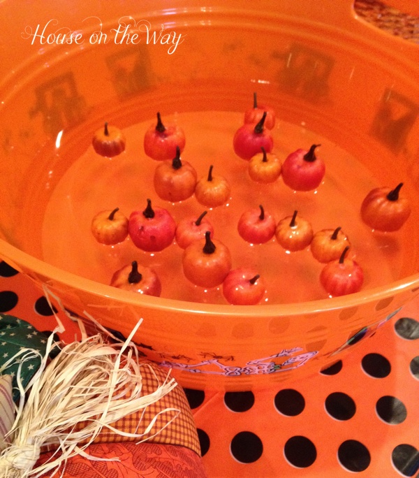 diy fall game for a festival or party, crafts, seasonal holiday decor, A tub of water and foam pumpkins are all you need