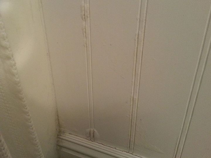 repairing water damaged wainscoting, home maintenance repairs, how to, wall decor, The horrible horrible swollen particle board