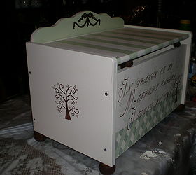 toy box, painted furniture, stenciled a tree on both sides And a resin scroll work on the top