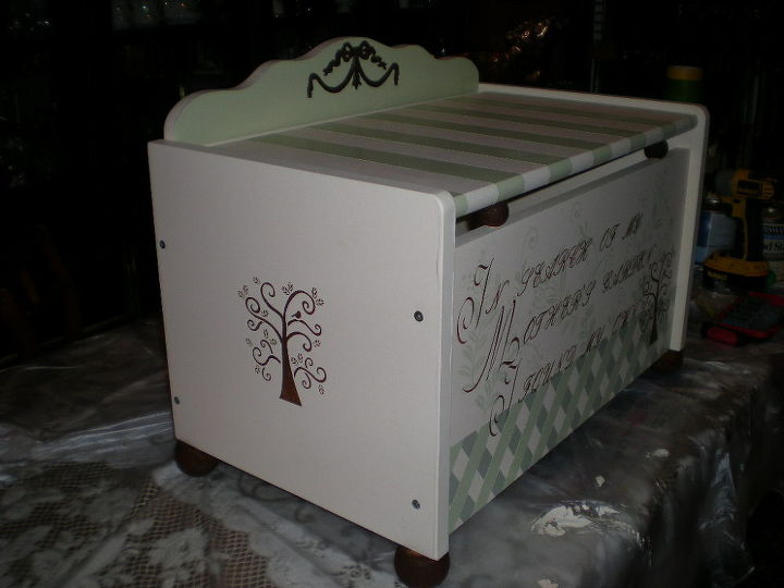 toy box, painted furniture, stenciled a tree on both sides And a resin scroll work on the top