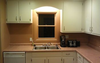 From green to a dream- our kitchen cabinets get painted!