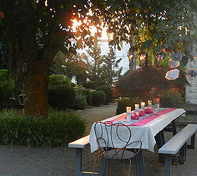 zebra and pink courtyard table scape for sweet 16 party, home decor, outdoor living, The table was set in the courtyard under the chestnut tree It s just 2 Costco picnic tables end to end Covered in a 4 x 15 canvas dropcloth With a table runner of pink and zebra print fabric