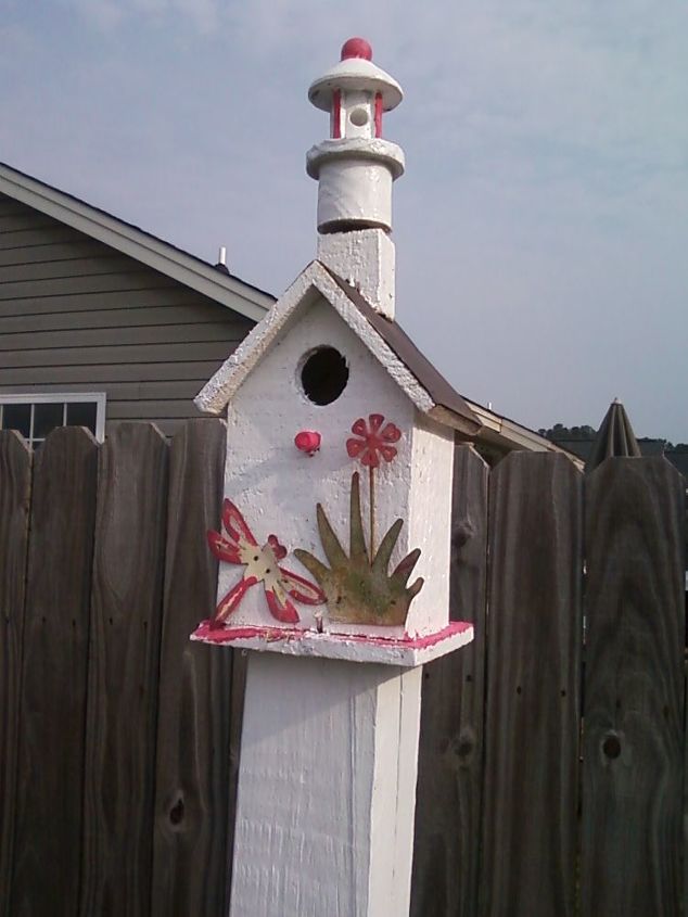 a galvanized watering can is just a watering can until, gardening, repurposing upcycling, Isn t it a cute and simple birdhouse and yes This house is occupied