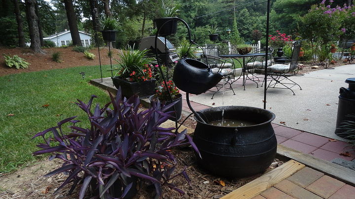 vintage iron cauldron and kettle fountain, flowers, outdoor living, patio, ponds water features, A different way to use our treasures make a fountain