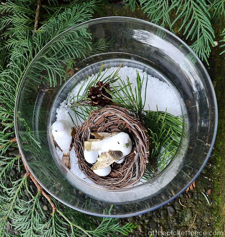 winter nesting make a winter y scene in a glass bowl, crafts, seasonal holiday decor, Add a sprig of fresh greenery to finish it off